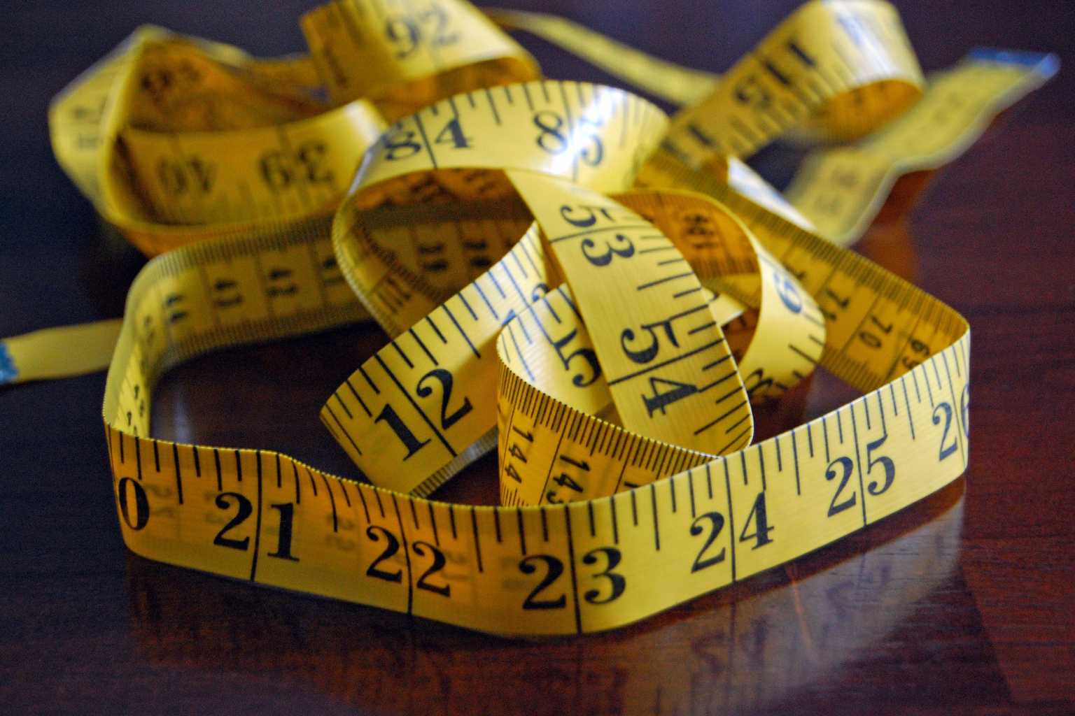 measure_yellow-measuring-tape_tangled_intertwined_by-jamie-via-flickr-100826131-orig-2